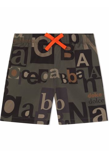 Dolce & Gabbana Kids Shorts con logo all-over - Verde