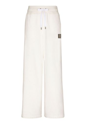 Dolce & Gabbana Pantaloni sportivi con placca logo - Bianco