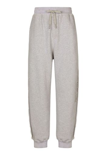 Dolce & Gabbana Pantaloni sportivi con stampa - Grigio