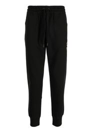 Dolce & Gabbana crest-embroidered track pants - Nero