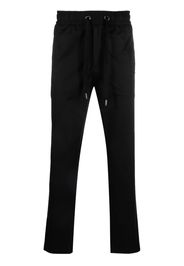 Dolce & Gabbana logo-plaque track pants - Nero