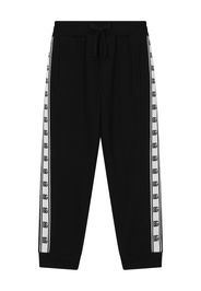 Dolce & Gabbana Kids Pantaloni sportivi con banda logo - Nero