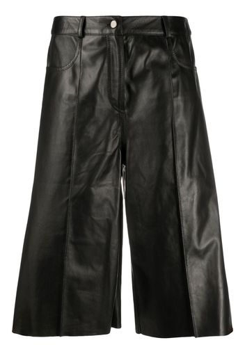 knee-length leather shorts