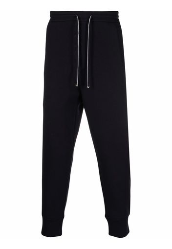 Emporio Armani tapered-leg solid tarck pants - Blu