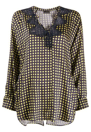 Blusa oversize a pois