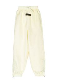 FEAR OF GOD ESSENTIALS logo-patch track pants - Toni neutri