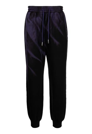 Feng Chen Wang Pantaloni sportivi con fantasia tie-dye - Viola