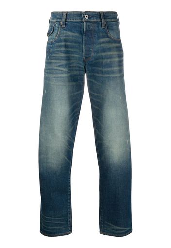 low rise tapered jeans