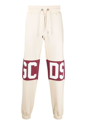 Gcds logo-print cotton track pants - Toni neutri