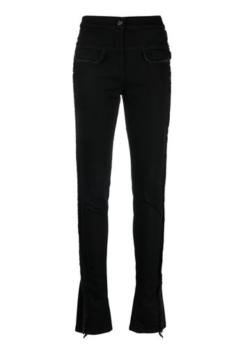 Genny Pantaloni skinny con frange - Nero