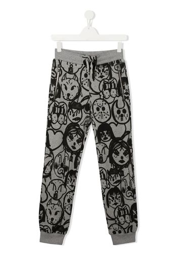 Givenchy Kids graphic print track pants - Grigio