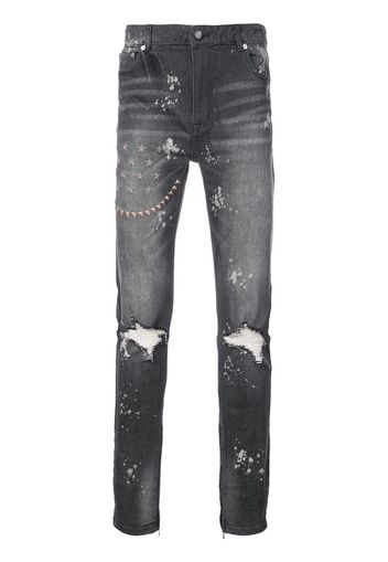 ripped embroidered slim-fit jeans