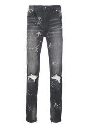 ripped embroidered slim-fit jeans