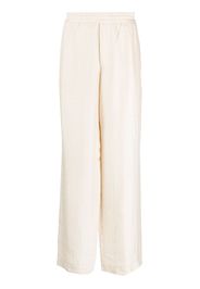 Golden Goose lyocell-linen blend loose-fit trousers - Toni neutri