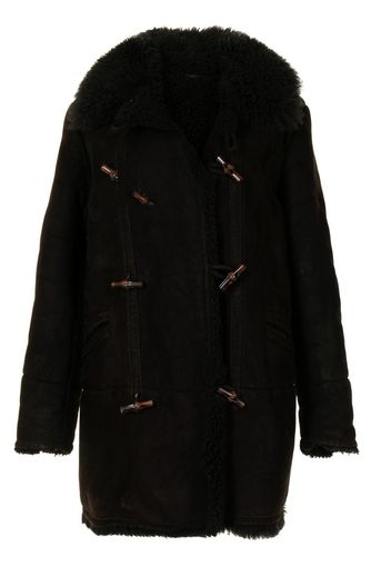 Cappotto con revers in shearling