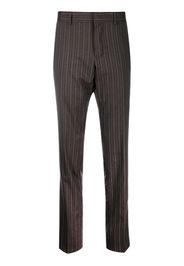 Gucci Pre-Owned 2000s pinstriped slim-legged tailored trousers - Grigio