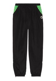 Gucci Pantaloni sportivi GG con inserti - Nero