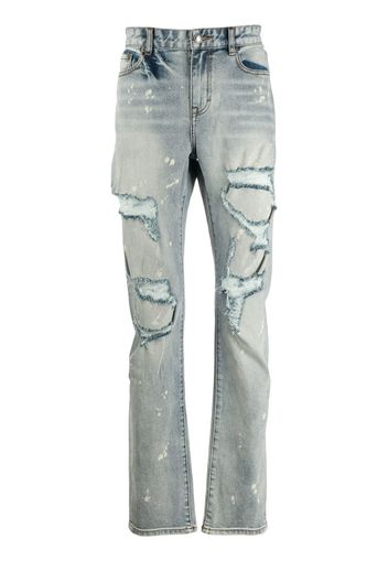 Jeans slim con effetto vissuto