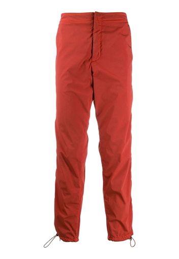 Pantaloni con zip laterali