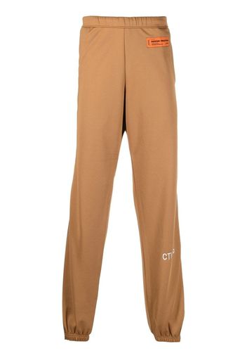 Heron Preston logo-patch track pants - Marrone