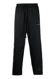 Ih Nom Uh Nit logo-print track trousers - Nero