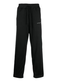 Ih Nom Uh Nit logo-embellished side panels track pants - Nero