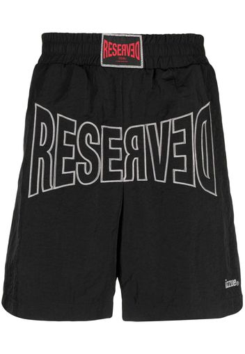 izzue logo-patch track shorts - Nero