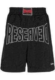 izzue logo-patch track shorts - Nero