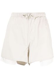 izzue oversize-pocket drawstring shorts - Toni neutri