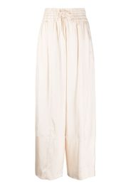 Jil Sander pressed-crease palazzo pants - Toni neutri