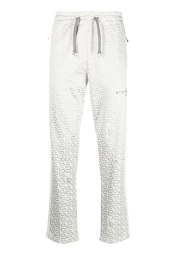 John Richmond snake-motif studded track pants - Toni neutri