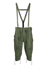 Junya Watanabe MAN graphic-print suspender cropped trousers - Verde