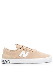 Junya Watanabe logo-patch sneakers - Toni neutri