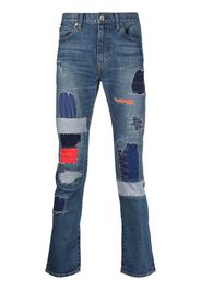 Junya Watanabe Jeans slim con design patchwork - Blu