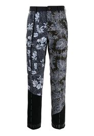 JUST IN XX Pantaloni a fiori - Nero