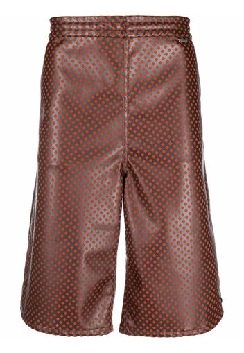 Koché perforated-detail faux-leather shorts - Marrone