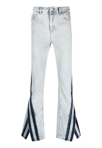 Koché logo-patch trousers - Blu