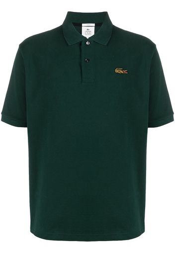 green polo shirt