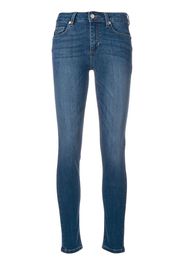 Jeans slim con effetto schiarito