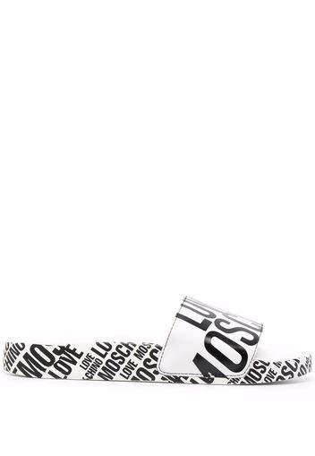 Love Moschino Sandali slides con stampa - Bianco