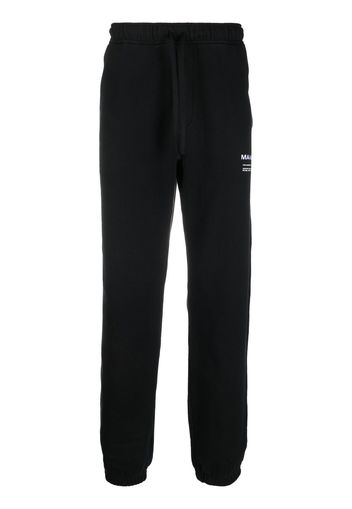 Maharishi logo-embroidered organic track pants - Nero