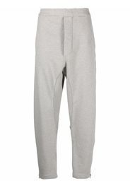 Maison Margiela logo embossed track pants - Grigio