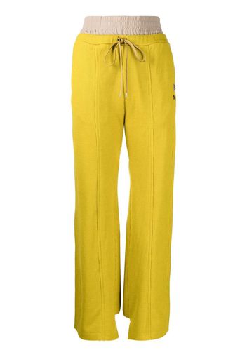 Maison Mihara Yasuhiro logo-patch flared trousers - Giallo