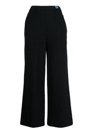 Maison Mihara Yasuhiro exposed-seam knitted trousers - Nero