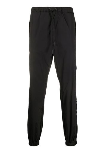 Cross tapered track pants