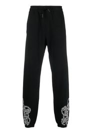 Marcelo Burlon County of Milan logo-print organic-cotton track pants - Nero