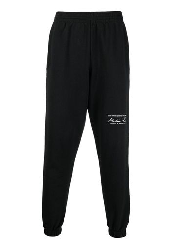 Martine Rose logo-print slim-fit track pants - Nero