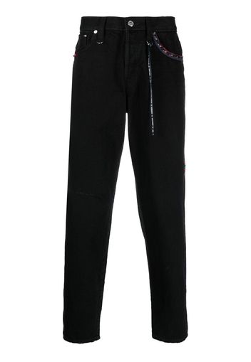 Mastermind World logo-embroidered ankle-zip jeans - Nero