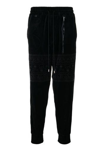 Mastermind World Pantaloni sportivi con stampa - Nero