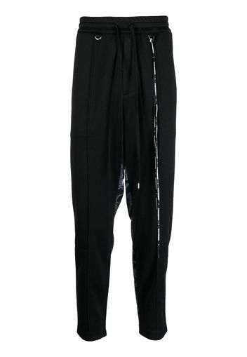 Mastermind World Pantaloni sportivi con stampa camouflage - Nero